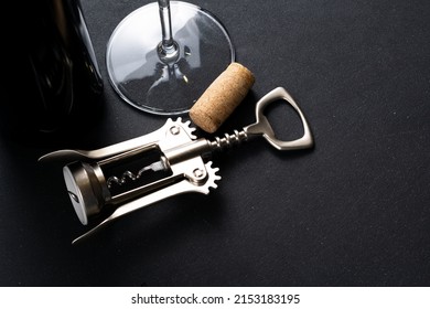 Bottle of Wine and corkscrew