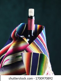 Bottle Of Wine Covered With A Serape From Saltillo, Mexico.