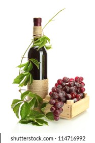 Bottle Of Wine With Grapes Isolated On White