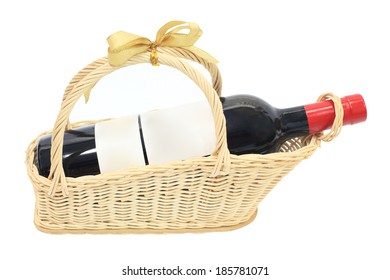 A Bottle Of Wine On Gift Basket Isolated On White