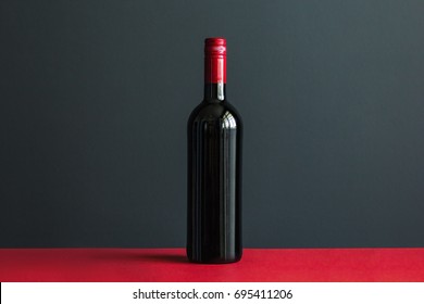 Bottle Of Wine On Red Table