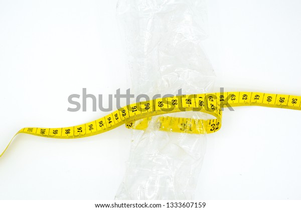 Download Bottle Yellow Measuring Tape Stock Photo Edit Now 1333607159 Yellowimages Mockups