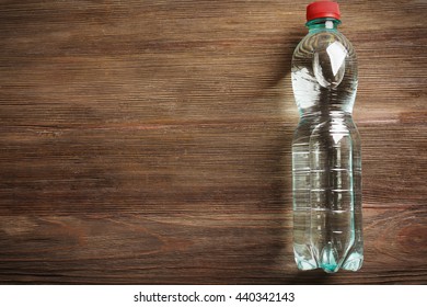 Bottled Water On The Wooden Table, Top View