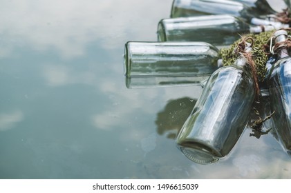 Bottles connected with notes inside float by the lake. Quests, games, adventures.