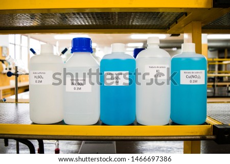 bottles with different solutions in chemistry laboratory