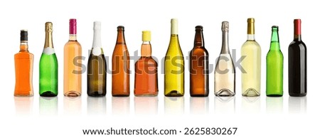 Bottles with different types of alcoholic drinks isolated on white, set