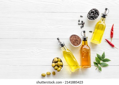 Bottles Of Different Types Cooking Oil. Sunflower Olive And Sesame Oil