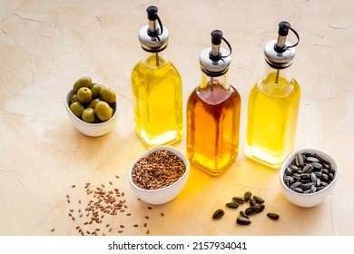 Bottles Of Different Types Cooking Oil. Sunflower Olive And Sesame Oil