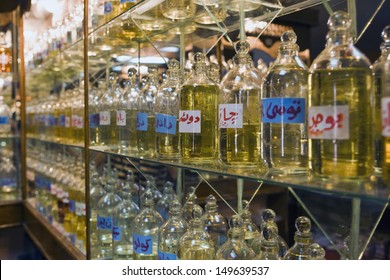 Bottles Of Essential Oils Used In Perfume Making Displayed In A Row