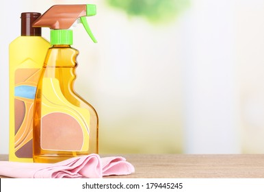 Bottles Of Furniture Polish On Wooden Table 