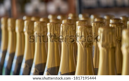 Bottles of Golden Headed Champagne