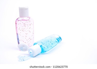 Bottles of lotion containing beads of microplastics. Microplastics are environmentally harmful and have been banned from use in some countries.