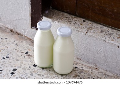 Bottles Of Milk On A Doorstep