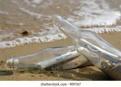 bottles on beach - Shutterstock ID 909767