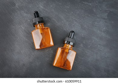 Bottles Perfume Oil On Grunge Background Stock Photo 610059911