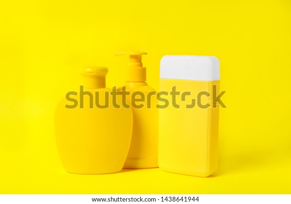 Download Bottles Shampoo On Yellow Background Natural Stock Photo Edit Now 1438641944 PSD Mockup Templates