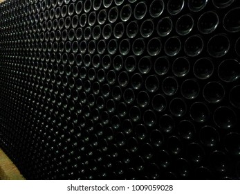 bottles stacked in cellar