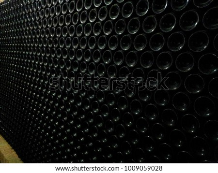 bottles stacked in cellar