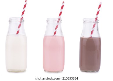 Bottles Of Vanilla, Chocolate, And Strawberry Milk 