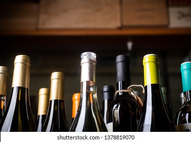 Bottles Of Wine On The Shelves Of An Alcohol Shop In Spain, Alicante. Background