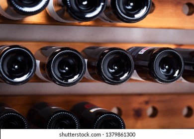 Bottles Of Wine On The Shelves Of An Alcohol Shop In Spain, Alicante. Background