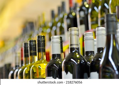 Bottles Of Wine In Rows In Liquor Store, Selective Focus.