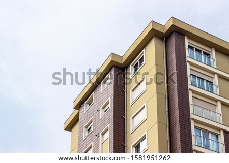 Bottom clear shoot of mass housing dark yellow facade color building