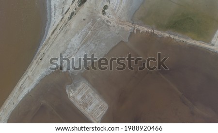 The bottom of a dried up salt lake. View from the air. Traces of cars and motorcycles in the sand