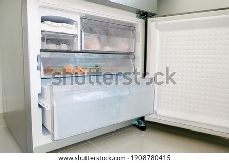 Bottom freezer of the refrigerator with drawer is opened