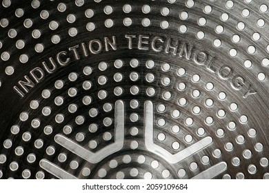 Bottom Of Induction Cookware. Texture Of A Non-stick Induction Pan Close-up