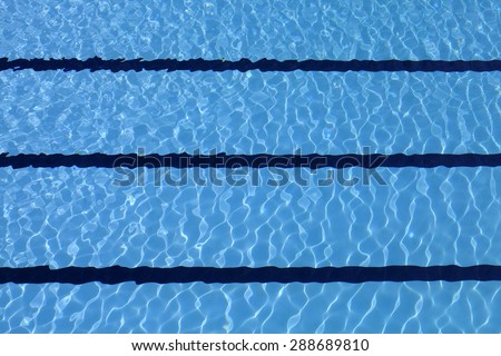 Bottom of the pool through the transparent waters