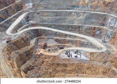 Bottom Of Surface Mining And Machinery In An Open Pit Mine In Waihi, New Zealand