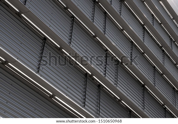 Bottom\
view of corrugated wall with metal floor\
dividers