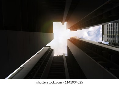 Bottom view of modern skyscraper. 