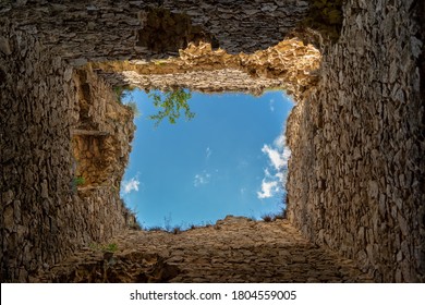 Bottom View Of An Old Fortress, Subjective Angle Of A Captive Man In A Prison Looking Helplessly At The Blue Sky Through The Window Formed By The High Walls Around Him, Prisoner Thinking About Freedom