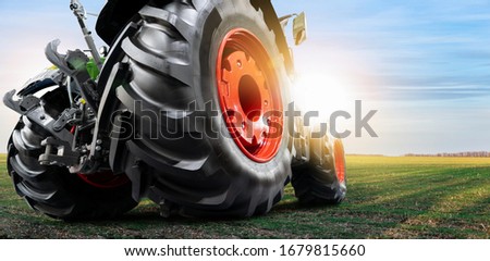 Bottom view of tractor. Close up of wheels