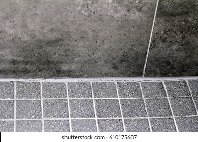 Bottom Wall Floor Corner Cracked Shower Tile Grout In Need Of Resealing Split. Cracked Bathroom Shower Tile Grout Corner Between Wall And Floor That Needs Repaired.