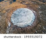 Bottomless circle Lake in spring forest of Solnechnogorsk District, Moscow region. Russia. Aerial view