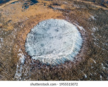 Bottomless circle Lake in spring forest of Solnechnogorsk District, Moscow region. Russia. Aerial view