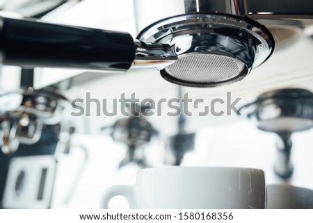 bottomless portafilter in the coffee machine bottom view
