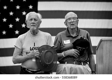 BOULDER, CO - May 25th, 2015 - US Military Service Men Stand In Formation For The National Anthem During The Bolder Boulder 10K Memorial Day Service At Colorado University's Folsom Field