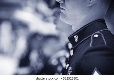 BOULDER, CO - May 25th, 2015 - US Military Service Men And Women Stand In Formation For The National Anthem During The Bolder Boulder 10K Memorial Day Service At Colorado University's Folsom Field