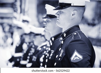 BOULDER, CO - May 25th, 2015 - US Military Service Men And Women Stand In Formation For The National Anthem During The Bolder Boulder 10K Memorial Day Service At Colorado University's Folsom Field