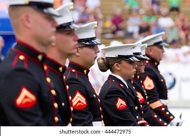 BOULDER, CO - May 30th, 2016 - US Military Service Men And Women Stand In Formation For The National Anthem During The Bolder Boulder 10K Memorial Day Service At Colorado University's Folsom Field