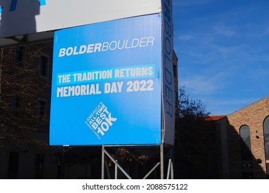 Boulder, CO USA - December 3, 2021: Sign Advertising The Return Of The Bolder Boulder 10K Road Race. The Tradition Returns Memorial Day 2022.