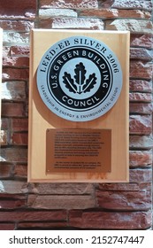 Boulder, CO USA - May 2, 2022: U.S. Green Building Council Silver Award, Leadership In Energy And Environmental Design. Silver And Black Medal On Wooden Plaque.