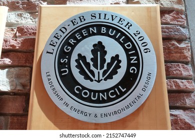 Boulder, CO USA - May 2, 2022: U.S. Green Building Council Silver Award, Leadership In Energy And Environmental Design. Silver And Black Medal On Wooden Plaque.