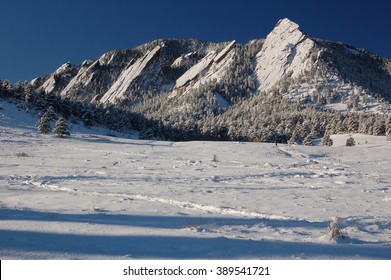 Boulder, Colorado Flatirons in Winter Snow and meadow