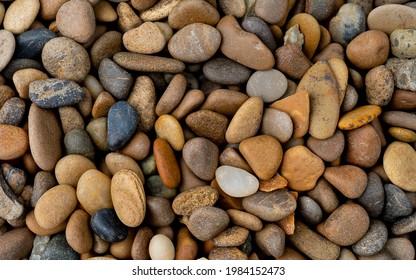 boulder pebble beach stones background seamless texture for design use, Naturally rounded gravel at sea shore Nature background texture pattern - Shutterstock ID 1984152473