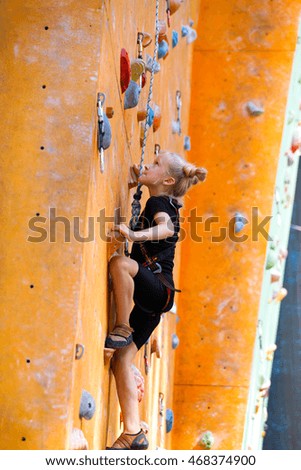 Similar – Image, Stock Photo Girl climbs climbing wall